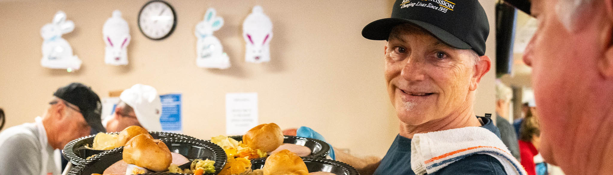 Serving Easter Meal in Dining Room